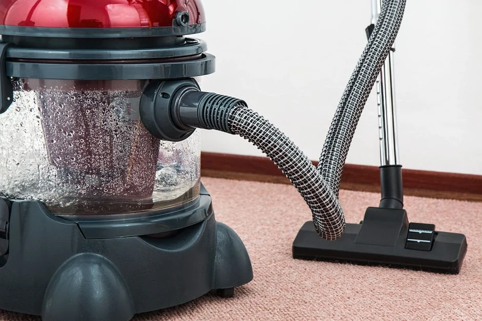 hero-img Minimalist desk with a focus on a multipurpose cleaner, office supplies, and storage solutions.